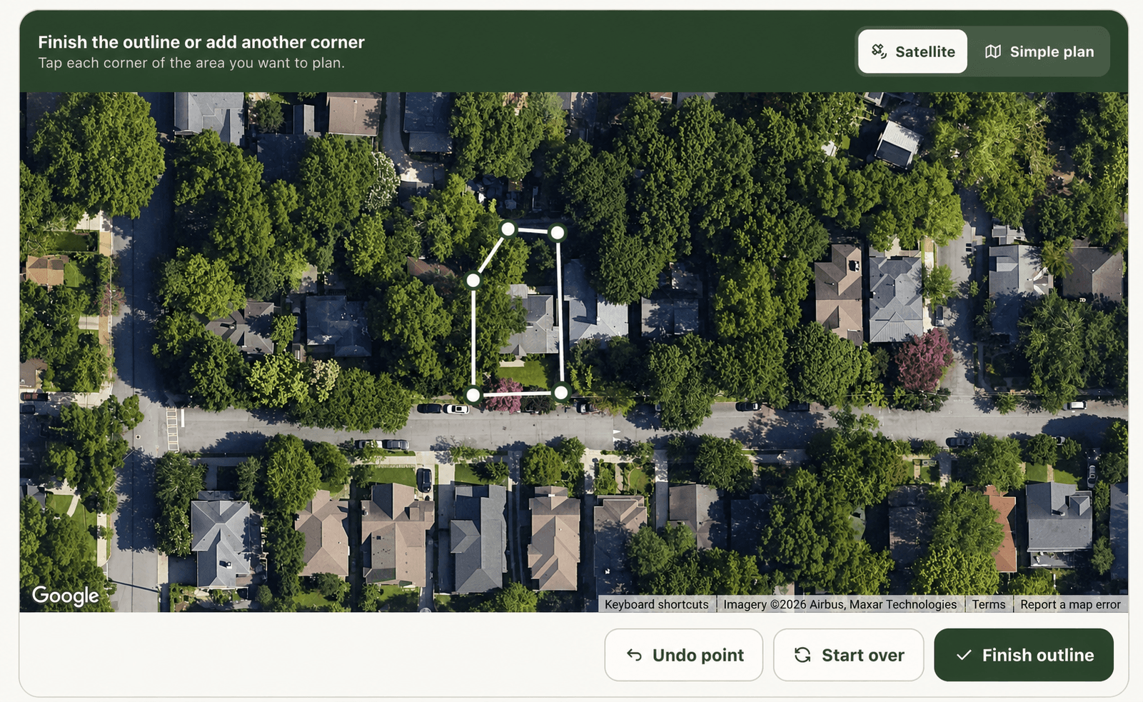 A sharp satellite view with a yard boundary outlined